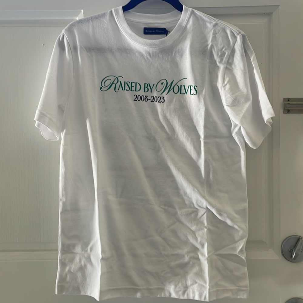 Stomping Grounds “ANNIVERSARY TEE” - RAISED BY WOLVES